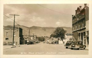 Postcard RPPC Idaho Salmon Main Street Marquee Hotel Texaco autos 23-1405