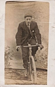 PROUD YOUNG MAN ON BICYCLE~1910s REAL PHOTO POSTCARD PROBABLY BRITISH