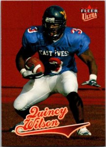 2004 Fleer Football Card Quinccy Wilson Atlanta Falcons sk9401