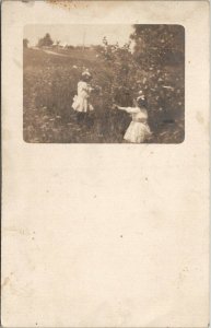 RPPC Girls Picking Flowers in Field Gertrude and Ruth Asgood c1900s Postcard V15