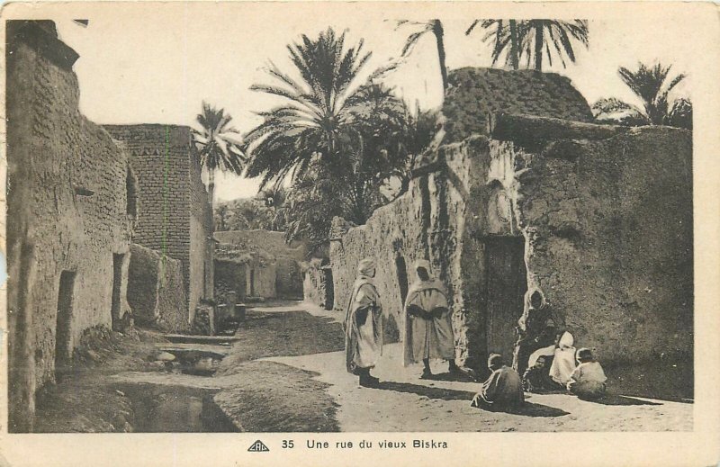 Algeria postcard Biskra ethnic types and scenes old street view