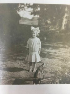 Real Photo Postcard Little Girl with Dog Big Bow RPPC AZO