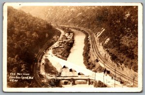 Postcard RPPC Cumberland MD c1935 The Narrows on US 40 Railway Tracks Train