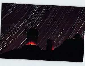 Postcard An open shutter makes the stars seem to spin around the Kitt Peak, AZ