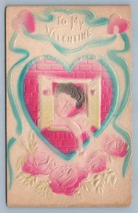 VALENTINE EMBOSSED ANTIQUE POSTCARD CUPID in WINDOW