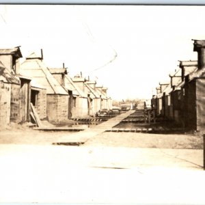 c1910s Odd Shanty Town RPPC Military Quarters? Resort Real Photo Postcard A134