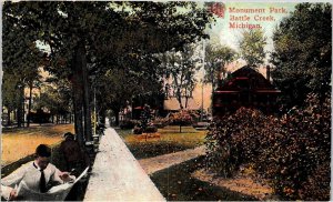 Battle Creek, Michigan - Reading a newspaper in Monument Park - in 1912