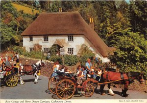 uk43910 rose cottage and horse drawn carriages cockington devon uk