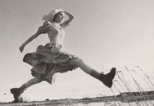 German Woman Leaping Jumping Over River Award Photo Postcard