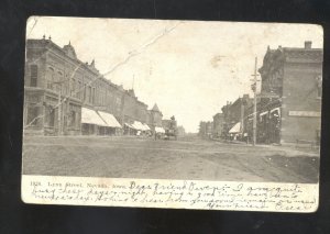 NEVADA IOWA DOWNTOWN LYNN STREET SCENE VINTAGE POSTCARD ROLAND IA CANCEL