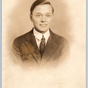 c1920s Detroit, MI Handsome Young Man Portrait RPPC Smirk Real Photo Studio A193