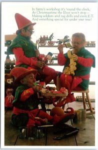 Season's Greetings with Elves at Santa's Workshop - Christmas Greeting Card