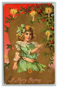 Vintage 1909 Christmas Postcard Cute Girl Places Candles on Xmas Tree Gold Face