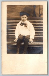 RPPC  Young Boy With Bow Tie  Real Photo  c1910