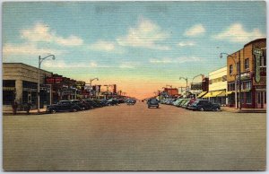 VINTAGE POSTCARD CARS PARKED ON BROADWAY (LOOKING WEST) AT HOBBS NEW MEXICO 1949