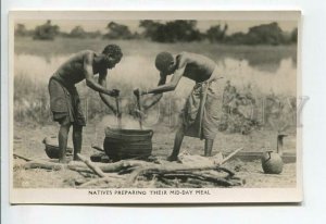 438925 British SOUTH Africa Zimbabwe natives preparing their mid-day meal photo