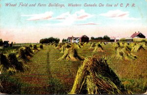 Canada Wheat Field and Farm Buildings In Western Canada