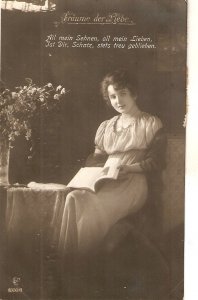 Lady reading a book Nice old vintage German postcard