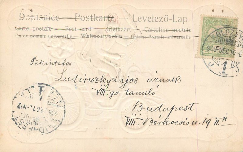 B581 Antique classic embossed Krampus devil creating chaos automobile scene 1900