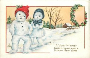 c1905 Merry Christmas snowman couple greeting Postcard 25-11446