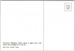 VINTAGE CONTINENTAL SIZE POSTCARD STREET SCENE AT NIGHT AT EFFINGHAM ILLINOIS