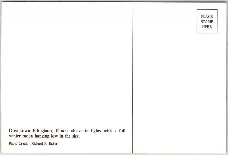 VINTAGE CONTINENTAL SIZE POSTCARD STREET SCENE AT NIGHT AT EFFINGHAM ILLINOIS