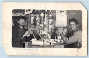 Cohagen MT Postcard RPPC Photo Postcard Shack Occupational Worker Enjoying Lunch