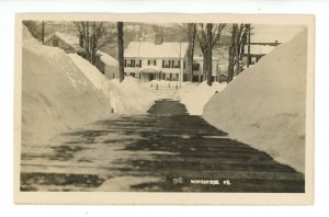 VT - Woodstock. Winter Street Scene, High Snow Banks  RPPC
