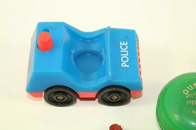 4 Retro Toys Rubber Space Man Fisher Price Police Car Duncan Yo-Yo Pipe