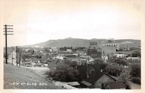 RPPC ELKO NEVADA BODY & FENDER WORKS CAR SIGNAGE REAL PHOTO POSTCARD (c. 1950s)