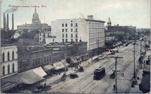 Postcard MI Lansing Washington Avenue View Streetcar Meat Market Shop ~1910 V193