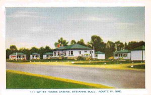 White House Cabins Motel Ste Anne Bulv Quebec Canada 1950s postcard