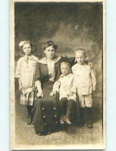 Pre-1918 rppc GIRL WITH BROTHERS & MOM r5979