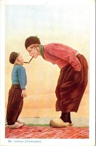 Volendam, Netherlands  DE ROOKERS Man & Boy Smoking Cigars  ca1920's Postcard