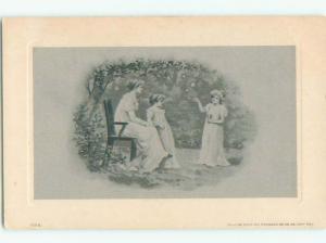 Unused Pre-1907 foreign TWO CUTE GIRLS BESIDE MOM IN CHAIR J4215