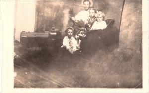 RPPC Postcard Antique Farm Family Outdoor Portrait Car? Carriage? c1930