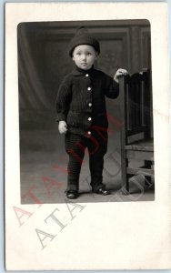 c1910s Cute Stoic Little Boy RPPC Stocking Cap Black Wool Sweater Photo Vtg A192