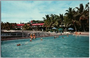 Vacationers Enjoying the Outdoor Pool on the Beach at Kona Inn Hawaii Postcard