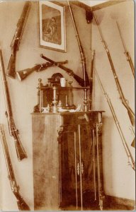 Guns Rifles on Wall Cabinet Unknown Location Unused Real Photo Postcard F86