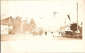 RPPC Antique Postcard Street Scene Minneota Minnesota c1910 Old Car Flag Ki11