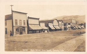 J34/ Paonia Colorado RPPC Postcard c1910 Main Street Stores Hotel 233