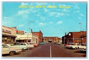 North Platte Nebraska NE Postcard Hello Johnny's Bus Depot Cafe Cars Scene 1972