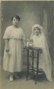 C-1910 Photo Studio Woman Child Religion Communion RPPC Photo Postcard 10504