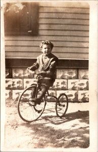 Real Photo Postcard Well Dressed Toddler Boy on a Tall Tricycle