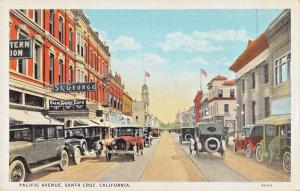 SANTA CRUZ CALIFORNIA~PACIFIC AVENUE-SIGNS-STOREFRONTS-OLD AUTOS POSTCARD 1927