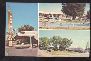 TUCUMCARI NEW MEXICO ROUTE 66 HIGHWAY AT NIGHT VINTAGE CARS POSTCARD