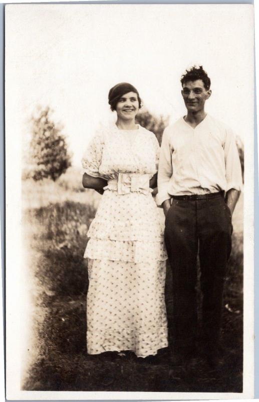 RPPC Portrait of Man and Woman - couple standing outside and smiling AZO 1904-19