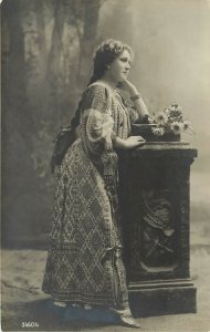 c1910 RPPC Postcard 3460 Beautiful Girl w Long Braid In Highly Embroidered Dress