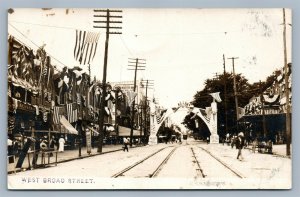 HAZLETON PA WEST BROAD STREET US FLAGS ANTIQUE REAL PHOTO POSTCARD RPPC