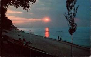 Enjoying Early Evening Dip Lake Erie Sunset Beach Postcard Plastichrome VTG UNP  